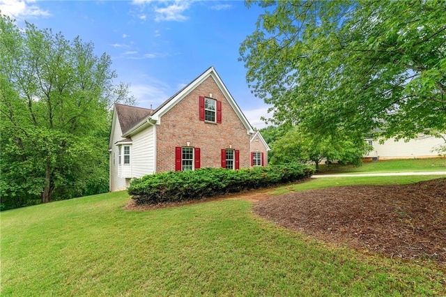 8770 Amberfield Dr, Gainesville, GA 30506 - view of side of property with a lawn and brick siding