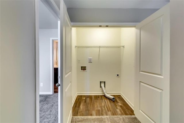 laundry area with hookup for an electric dryer, washer hookup, and light wood-type flooring