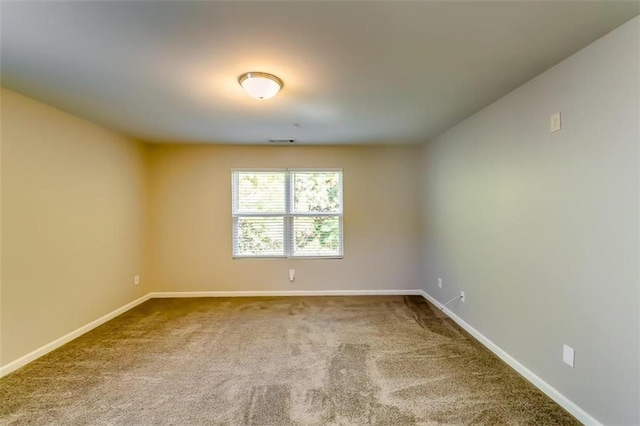 spare room with carpet flooring