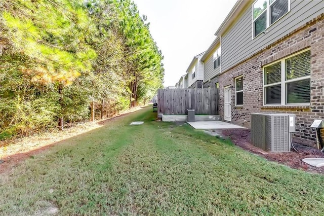 view of yard featuring a patio area and cooling unit