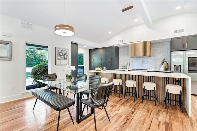 dining area featuring recessed lighting, visible vents, and light wood-type flooring