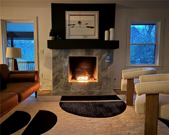 sitting room featuring a fireplace