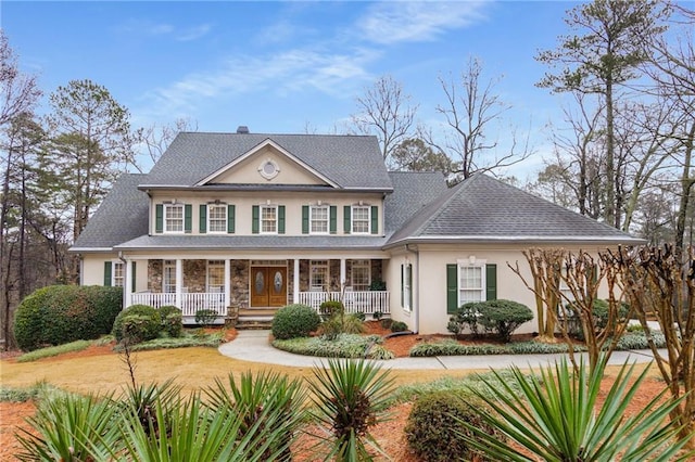 view of front of home featuring covered porch