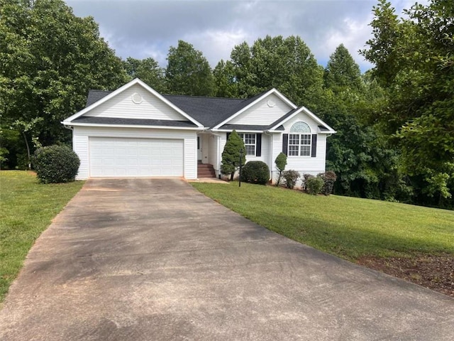 199 Rocky Shoals Trl, Mount Airy, GA 30563 - ranch-style home with driveway, an attached garage, and a front lawn