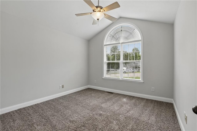 199 Rocky Shoals Trl, Mount Airy, GA 30563 - carpeted spare room featuring baseboards, a ceiling fan, and vaulted ceiling