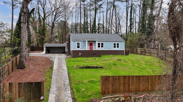 view of front of home with crawl space, driveway, a fenced backyard, and a front lawn