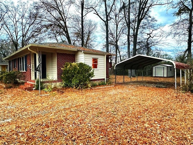 view of property exterior with a shed and a carport