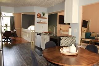 5022 Cliff Top Dr, Loganville, GA 30052 - dining room featuring dark wood-type flooring