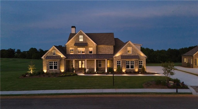 view of front of home with a front lawn