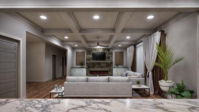 living room featuring beam ceiling, coffered ceiling, dark wood-type flooring, and a fireplace