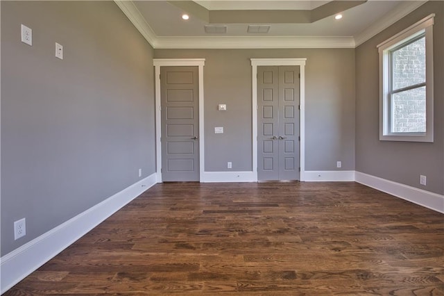 unfurnished bedroom featuring crown molding and wood-type flooring