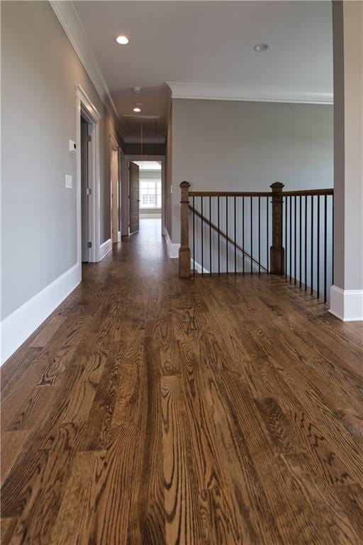 unfurnished room with dark hardwood / wood-style flooring and crown molding