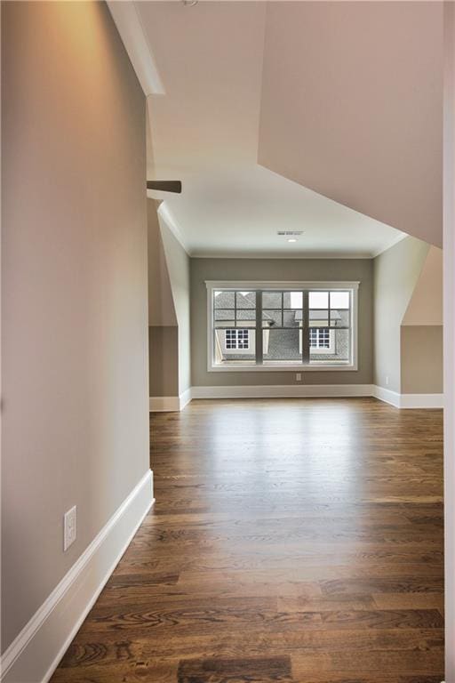 unfurnished living room featuring hardwood / wood-style flooring