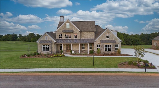 craftsman-style home featuring a front lawn and a porch