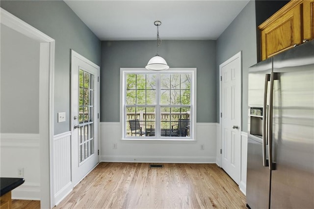 336 Toto Dr, Dawsonville, GA 30534 - unfurnished dining area with wainscoting and light wood-style floors
