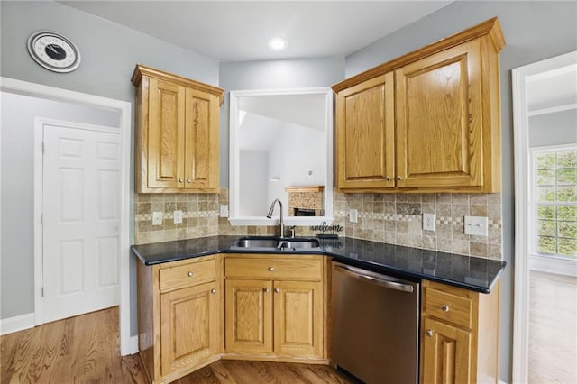 336 Toto Dr, Dawsonville, GA 30534 - kitchen with a sink, tasteful backsplash, stainless steel dishwasher, dark countertops, and wood finished floors
