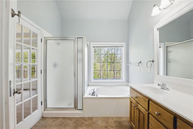 336 Toto Dr, Dawsonville, GA 30534 - bathroom with a healthy amount of sunlight, vanity, and a stall shower