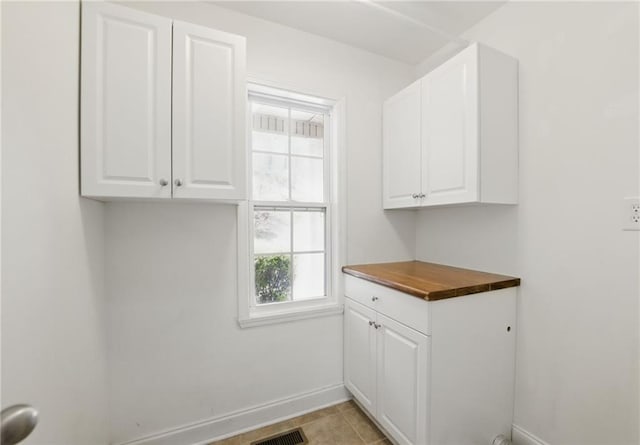 336 Toto Dr, Dawsonville, GA 30534 - clothes washing area featuring visible vents and baseboards