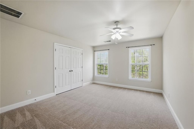 336 Toto Dr, Dawsonville, GA 30534 - unfurnished bedroom featuring carpet, visible vents, a closet, and baseboards