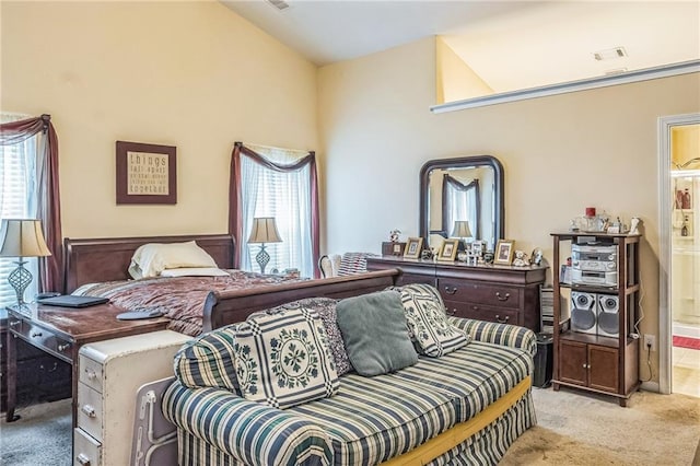 2606 Fairmont Park Ct, Dacula, GA 30019 - bedroom with lofted ceiling, ensuite bathroom, visible vents, and light colored carpet