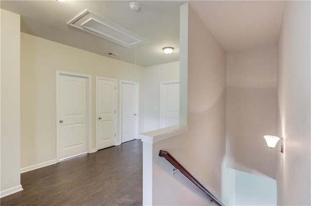 corridor with dark wood-type flooring