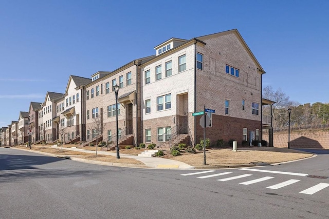 view of building exterior with a residential view