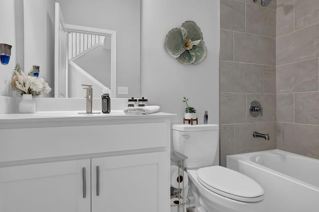 full bath with shower / bathtub combination, vanity, and toilet