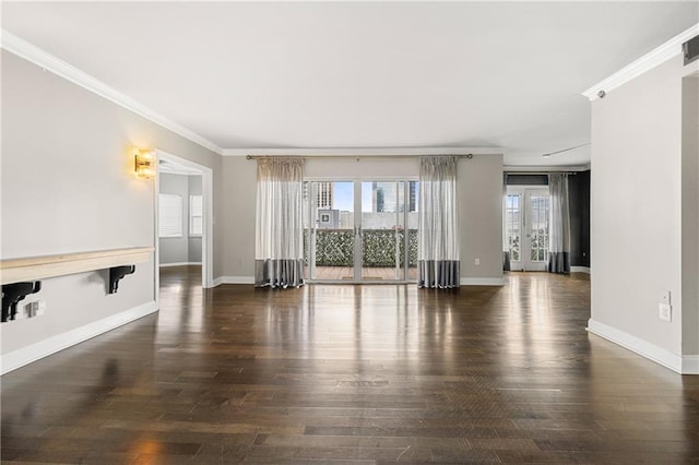 spare room with crown molding, french doors, and dark hardwood / wood-style floors