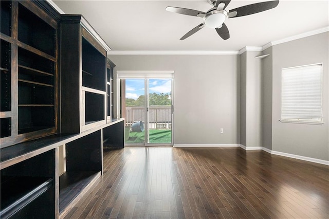 empty room with ceiling fan, dark wood-type flooring, and ornamental molding