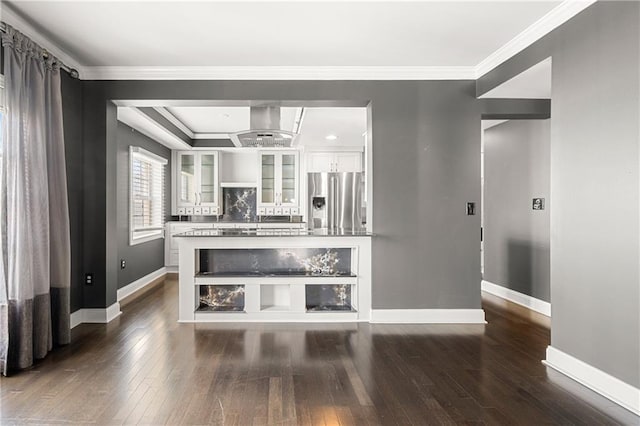 living room featuring dark hardwood / wood-style floors and crown molding