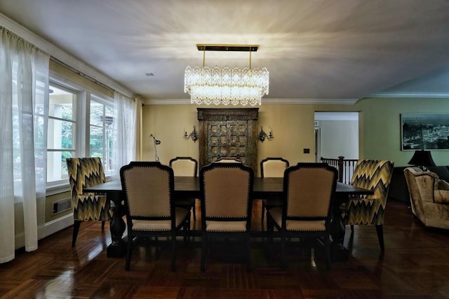 dining space with plenty of natural light, an inviting chandelier, crown molding, and dark parquet flooring