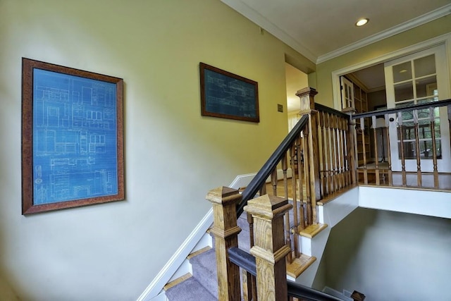 staircase with ornamental molding