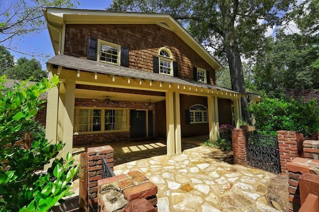 back of property featuring a patio