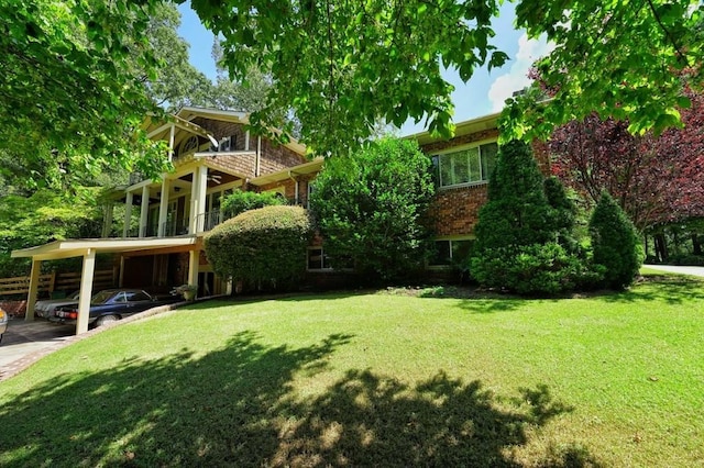 view of yard with a carport