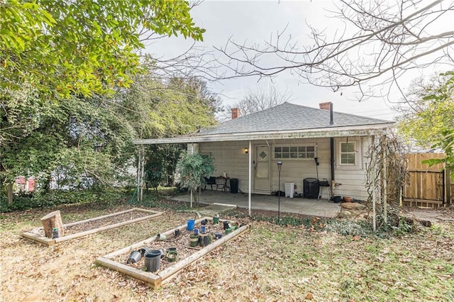 rear view of house featuring a patio area