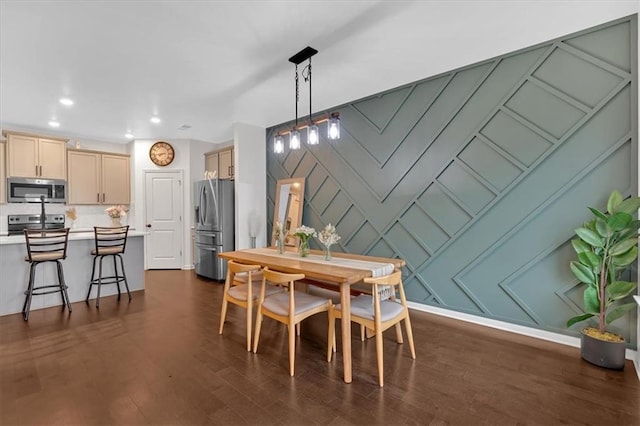 dining room featuring dark hardwood / wood-style flooring