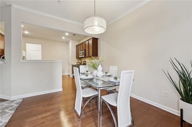 220 Ashley Ln SE Unit 19, Smyrna, GA 30080 - dining space with crown molding and wood finished floors