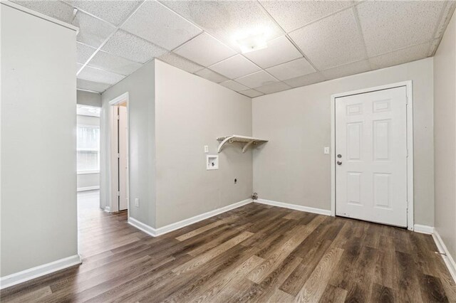 laundry area featuring wood finished floors, baseboards, hookup for an electric dryer, laundry area, and washer hookup