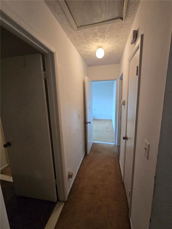 1297 Tree Creek Ct, Clarkston, GA 30021 - corridor with a textured ceiling and carpet
