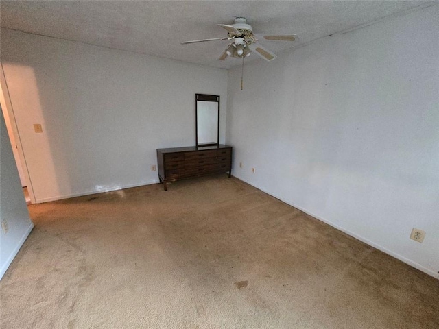 1297 Tree Creek Ct, Clarkston, GA 30021 - empty room with a ceiling fan and carpet flooring