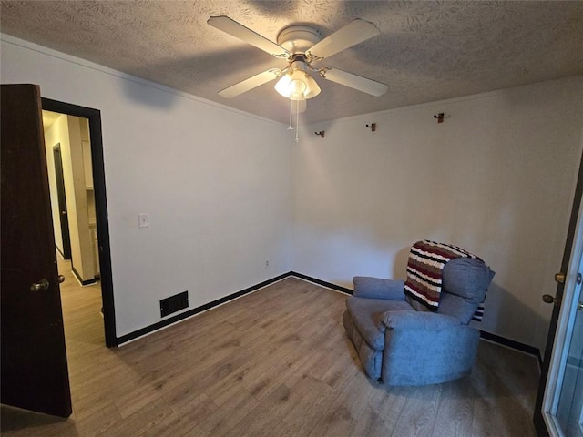 1297 Tree Creek Ct, Clarkston, GA 30021 - unfurnished room with wood finished floors, a textured ceiling, and ceiling fan