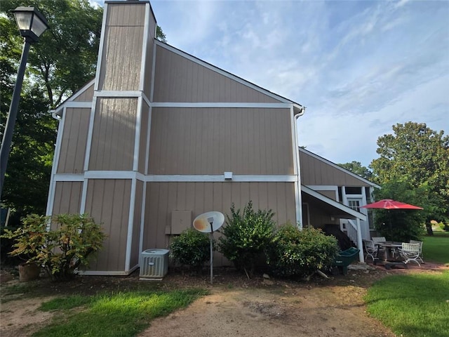 1297 Tree Creek Ct, Clarkston, GA 30021 - view of side of property with a central air condition unit