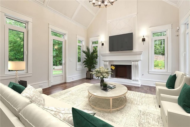 sunroom / solarium with lofted ceiling, a wealth of natural light, and a chandelier