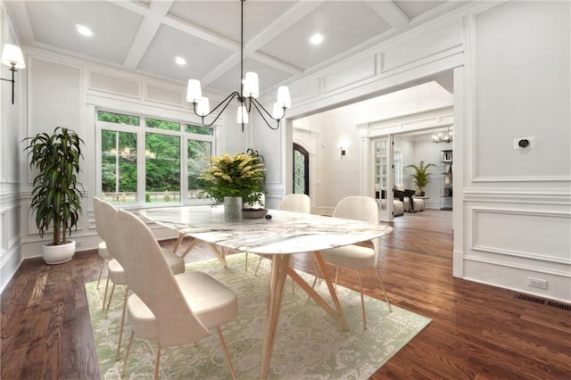 dining room with beamed ceiling, coffered ceiling, and dark wood-type flooring