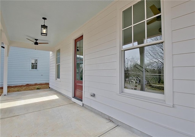 view of patio featuring ceiling fan