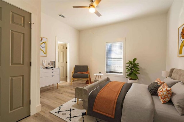 480 James P Brawley Dr NW, Atlanta, GA 30318 - bedroom with ensuite bath, light wood-style floors, visible vents, and ceiling fan