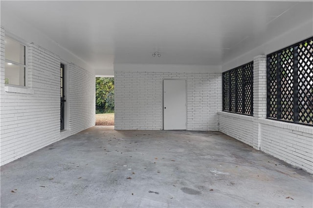 view of patio featuring a carport