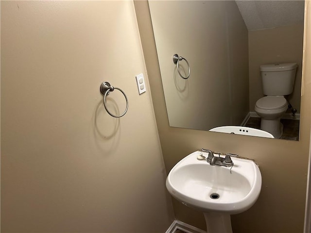 6536 Rebecca Lou Ln, Lithonia, GA 30058 - half bathroom with a sink and toilet