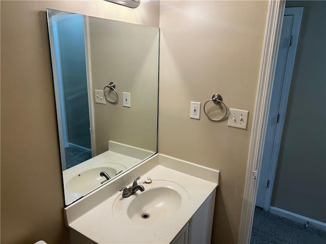 6536 Rebecca Lou Ln, Lithonia, GA 30058 - bathroom featuring vanity and baseboards