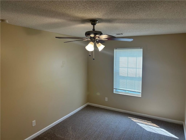 6536 Rebecca Lou Ln, Lithonia, GA 30058 - empty room with carpet flooring, a ceiling fan, baseboards, and a textured ceiling